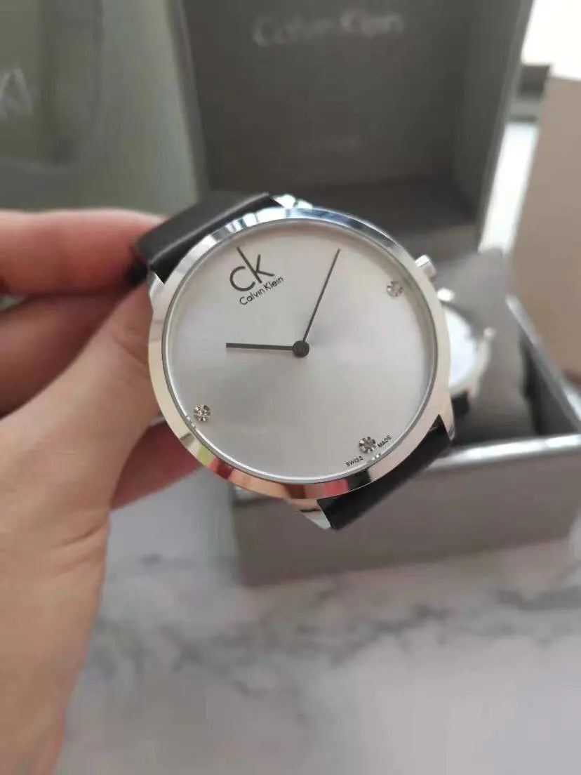 Calvin Klein Minimalist Silver Dial Black Leather Watch