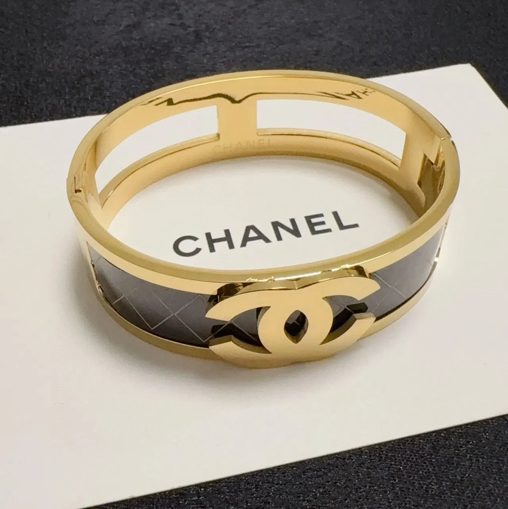 Silver-Tone Logo Bracelet on Wrist - Hình 5